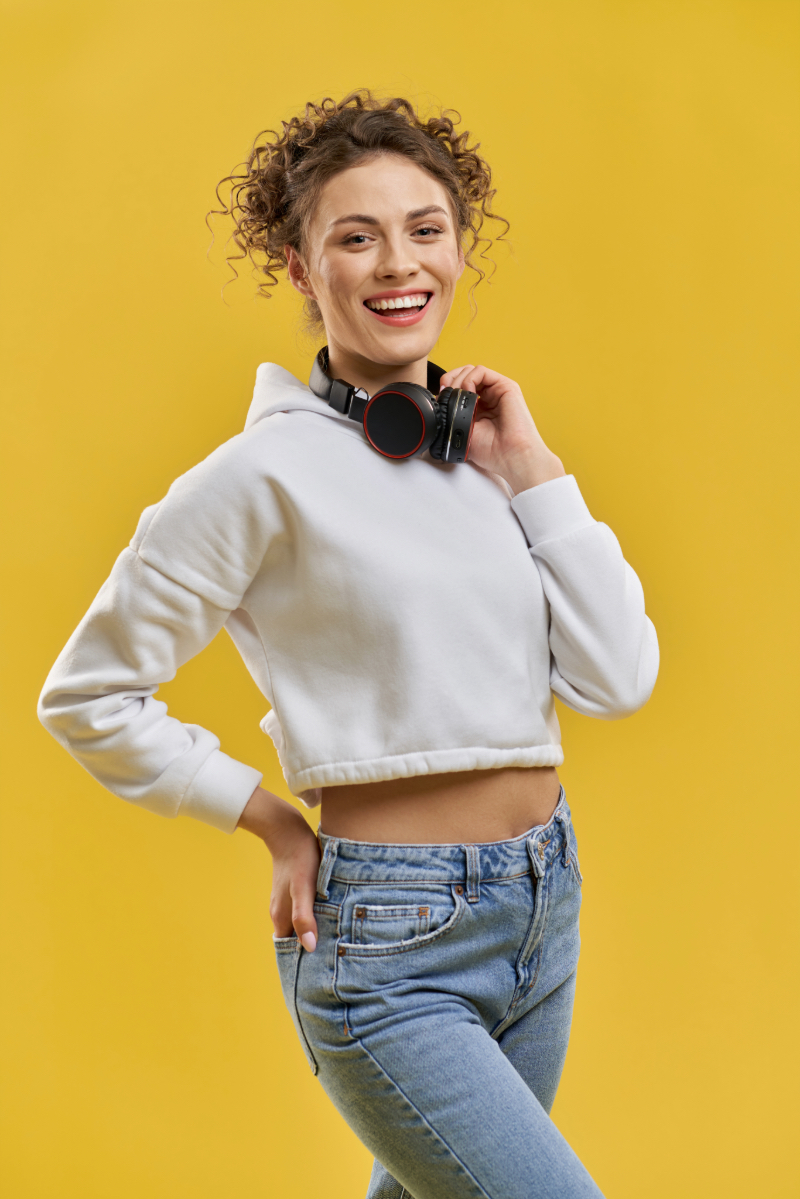 a model with a yellow background