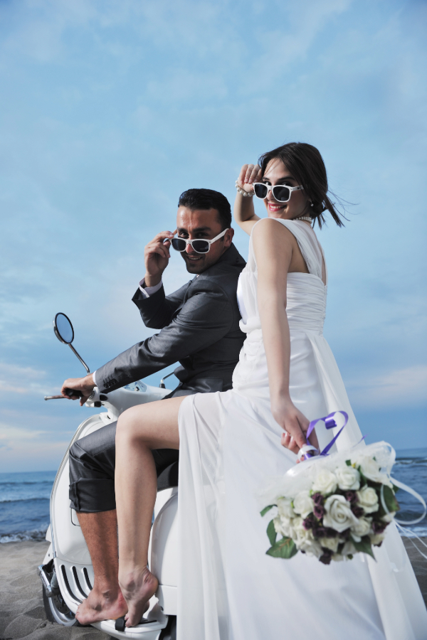 newlyweds on a scooter